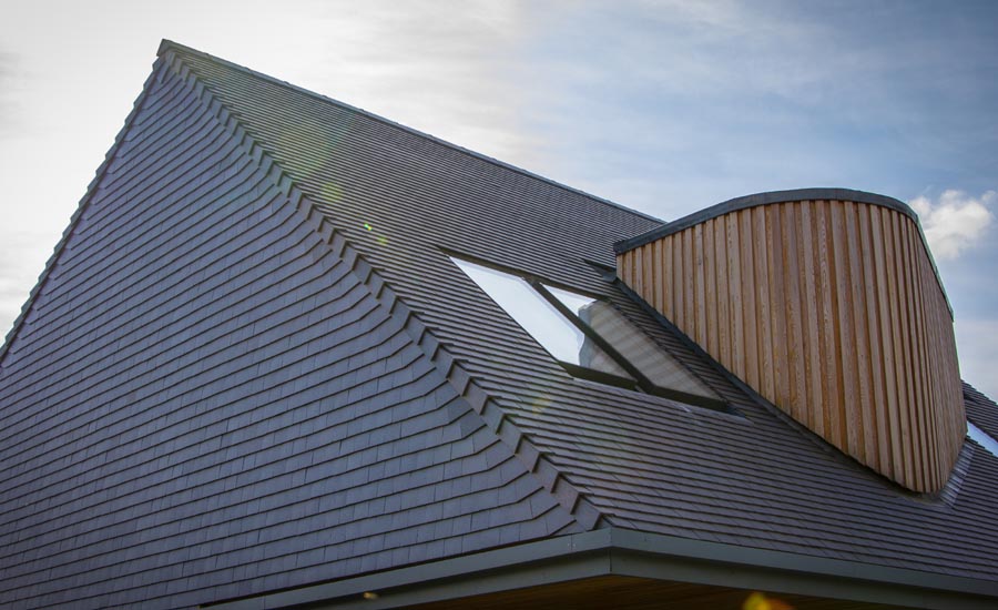 A Grand Design with Staffs Blue tiles and a timber roundel